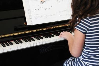 The best age to begin playing piano